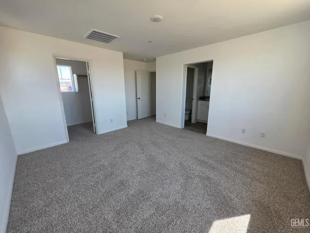 a view of an empty room with window