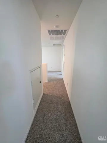 a view of a hallway with entryway