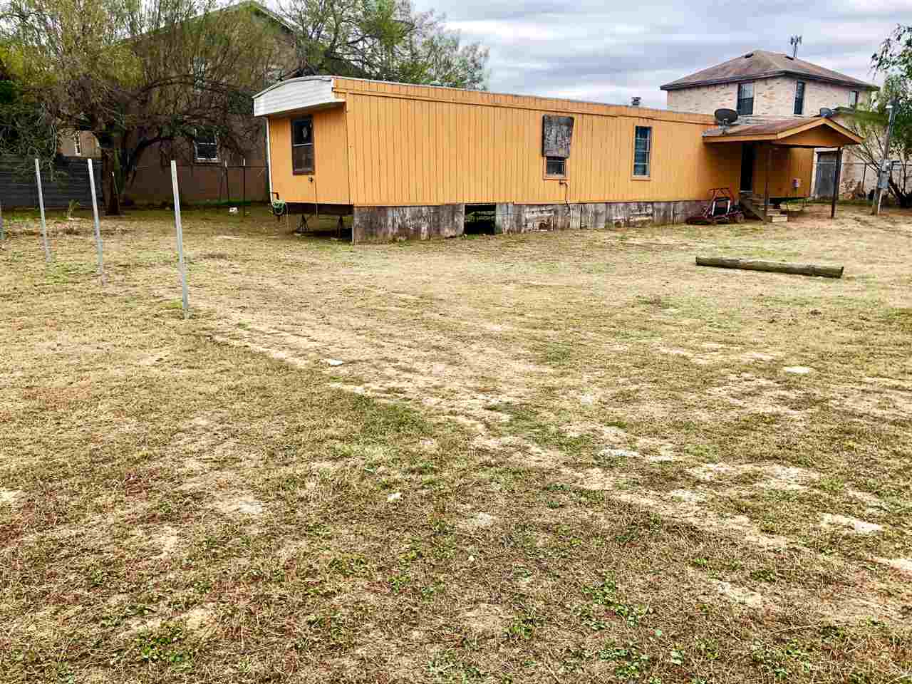 517 Rio Volga Road Rio Bravo, TX 78046 - Photo 8 of 10 a front view of a house with a yard