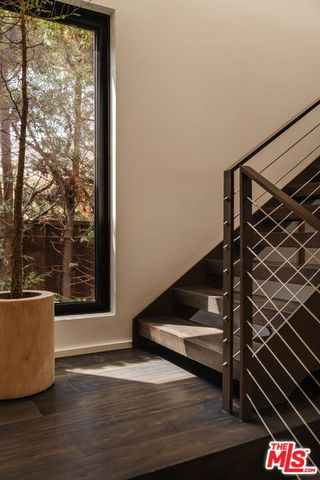 a bedroom with a bed and a closet