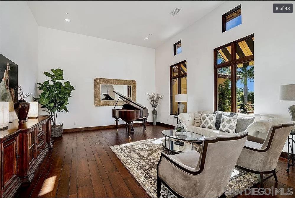 6702 St Andrews Road Rancho Santa Fe, CA 92067 - Photo 4 of 17 a living room with furniture and a potted plant