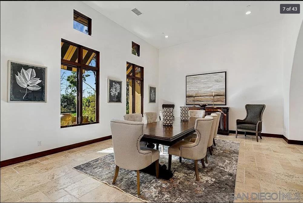 6702 St Andrews Road Rancho Santa Fe, CA 92067 - Photo 6 of 17 a dining room with furniture and window