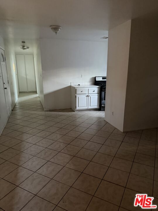 13173 Judd Street Pacoima, CA 91331 - Photo 3 of 9 a view of a refrigerator and window