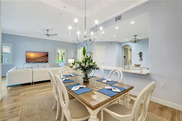 a kitchen with sink cabinets and window