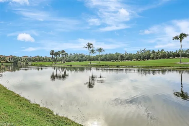 a view of a building with a yard