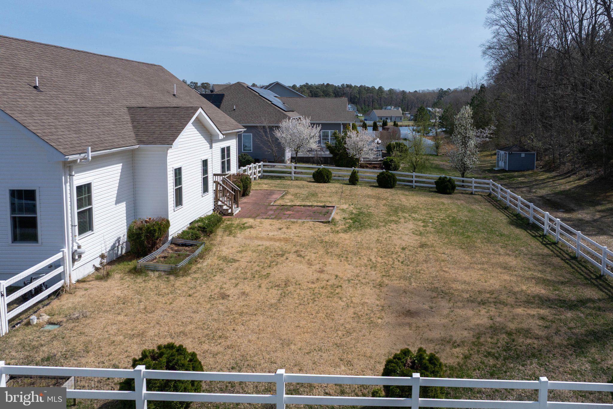 28751 Valley View Lane Lewes, DE 19958 - Photo 6 of 38 Spacious yard with serene surroundings.