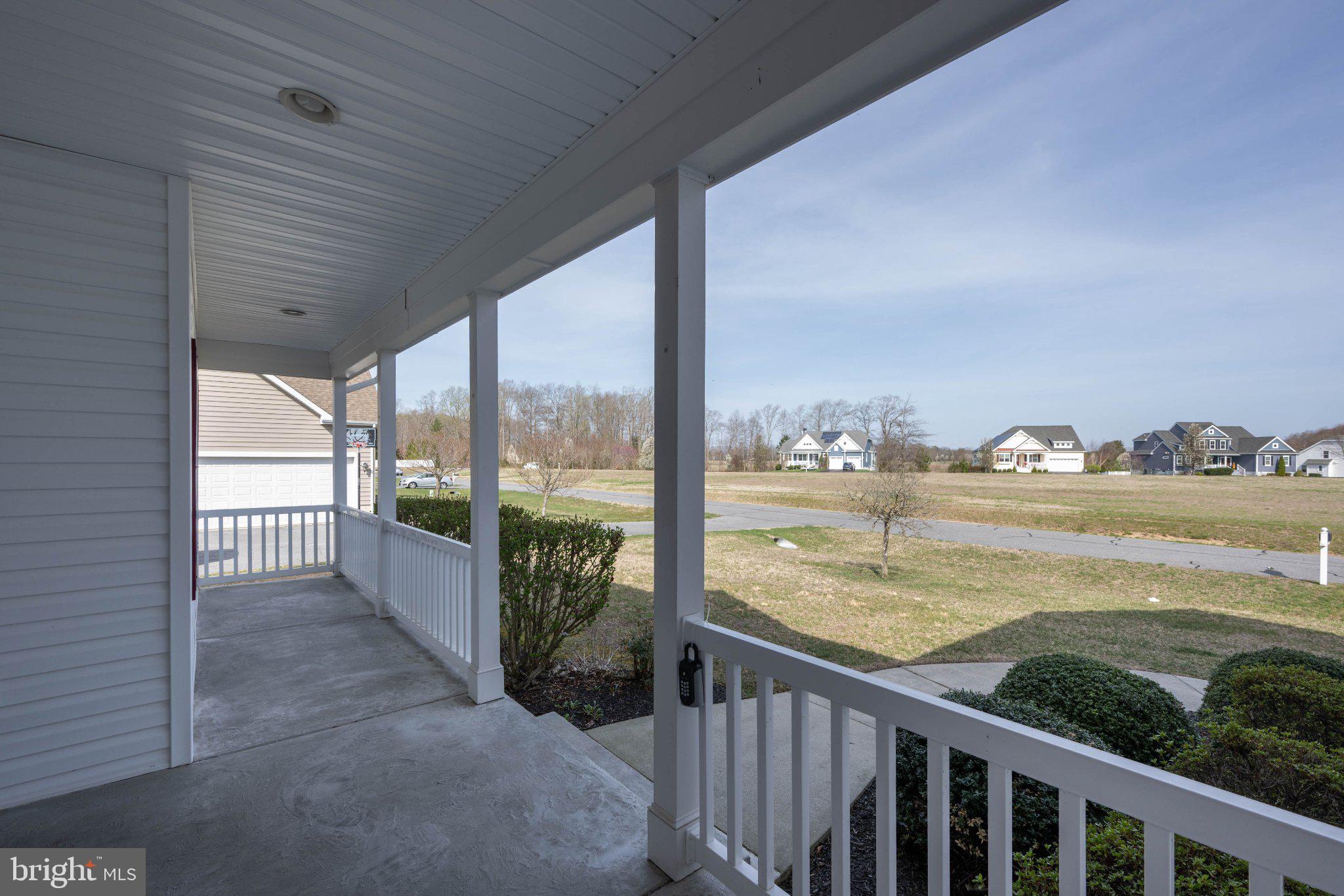 28751 Valley View Lane Lewes, DE 19958 - Photo 8 of 38 Charming porch with scenic views.