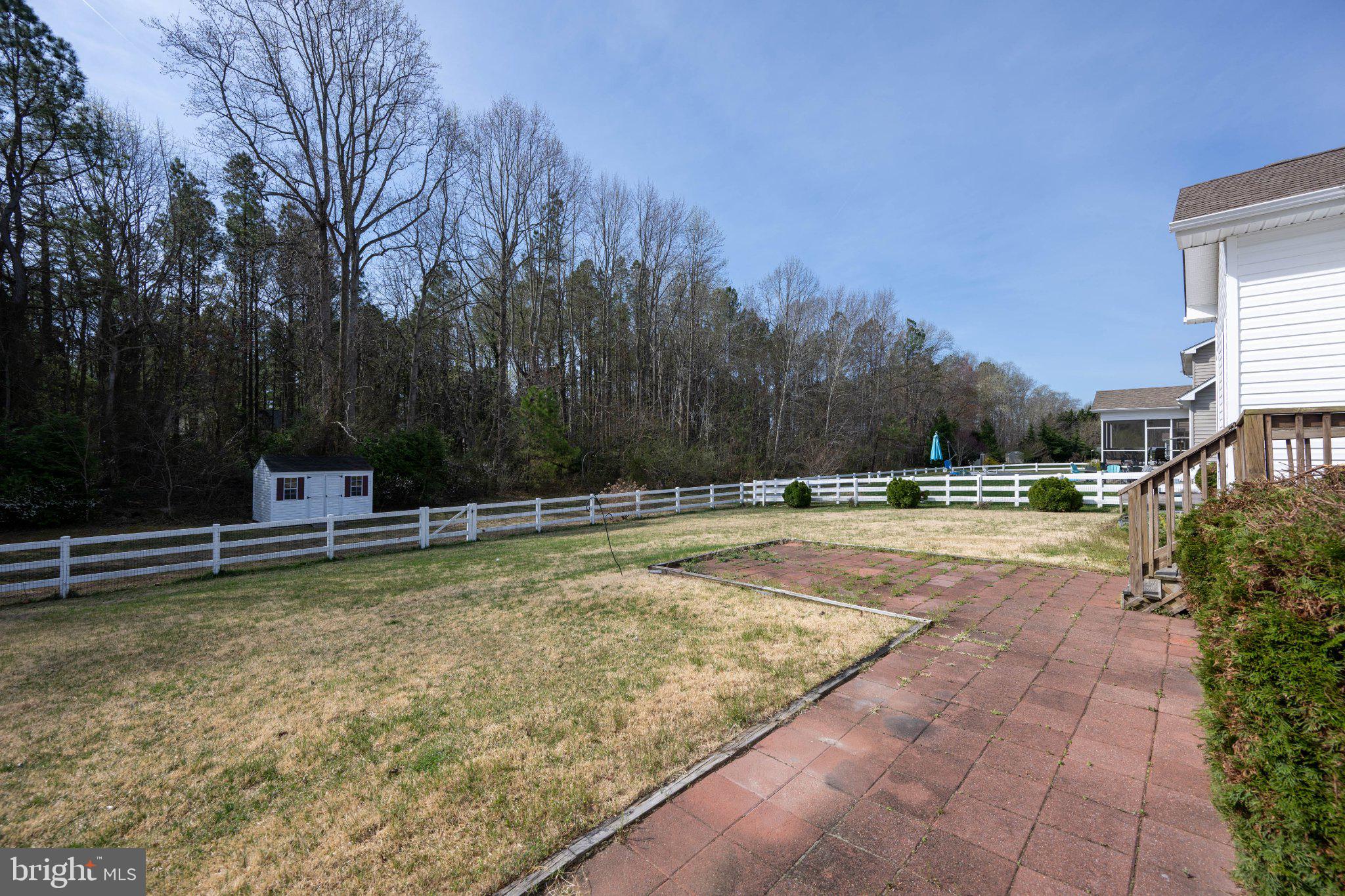 28751 Valley View Lane Lewes, DE 19958 - Photo 10 of 38 Spacious yard with serene woodland views.