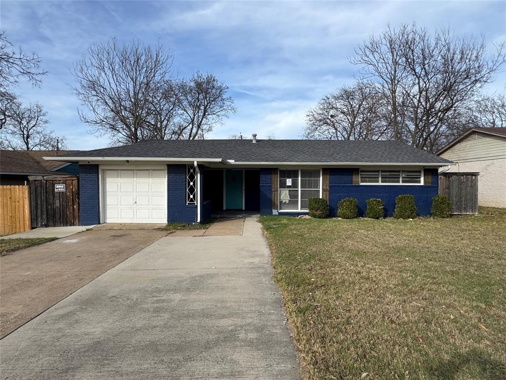 625 Midvale Drive Dallas, TX 75232 - Photo 1 of 11 a front view of a house with a garden and porch