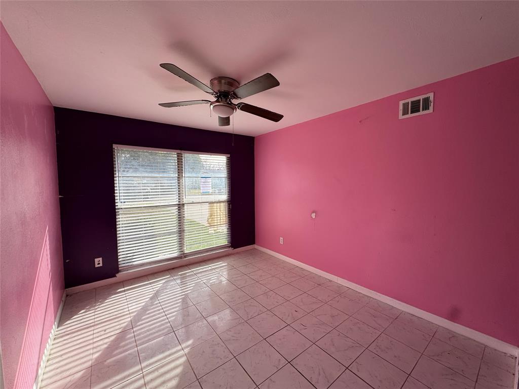 625 Midvale Drive Dallas, TX 75232 - Photo 11 of 11 a view of an empty room with a window