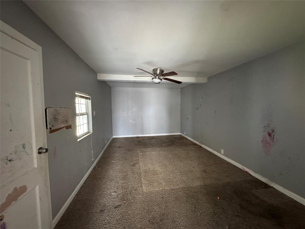 625 Midvale Drive Dallas, TX 75232 - Photo 6 of 11 an empty room with windows and entrance