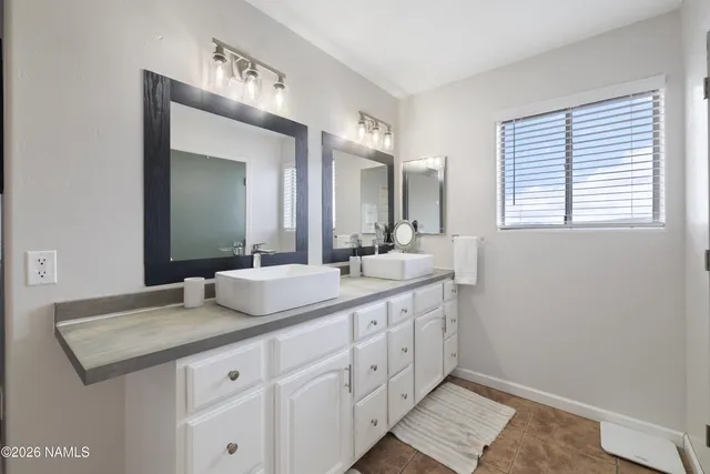 a white toilet sitting next to a shower curtain