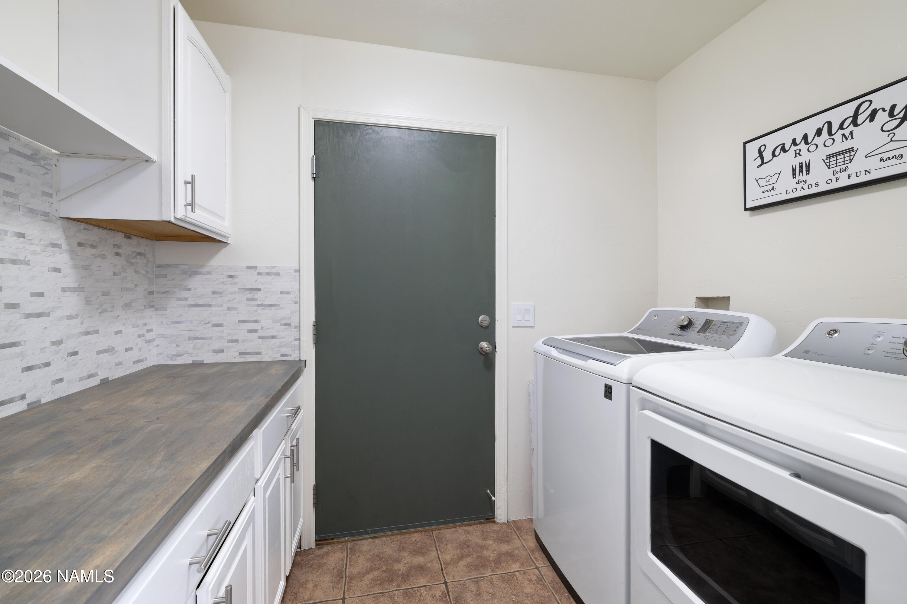 3097 Whitetail Loop Williams, AZ 86046 - Photo 25 of 46 Laundry Room/ Hallway from the Garage
