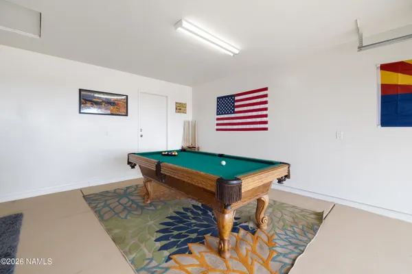 a view of a living room and a balcony