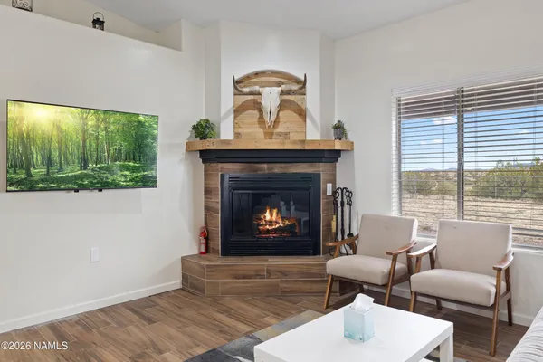 a kitchen with a sink stainless steel appliances and windows