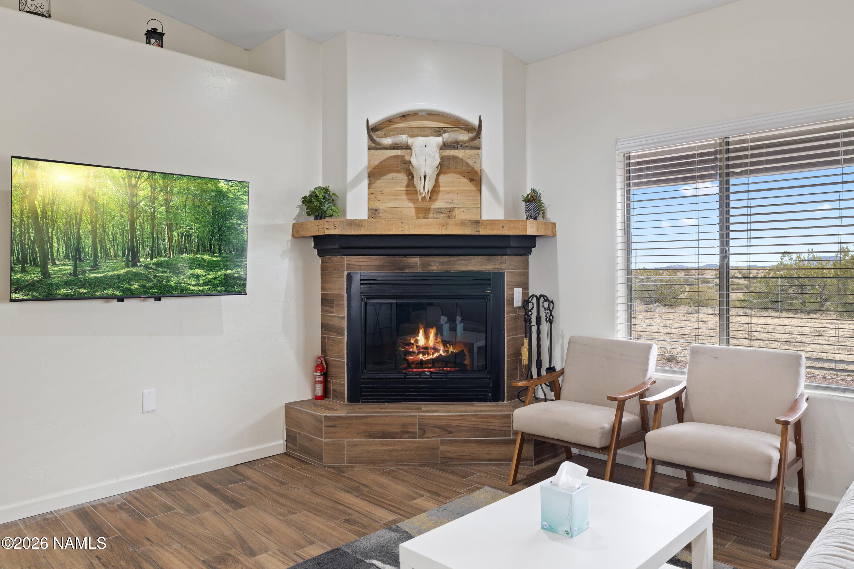 3097 Whitetail Loop Williams, AZ 86046 - Photo 7 of 46 a living room with furniture and a fireplace
