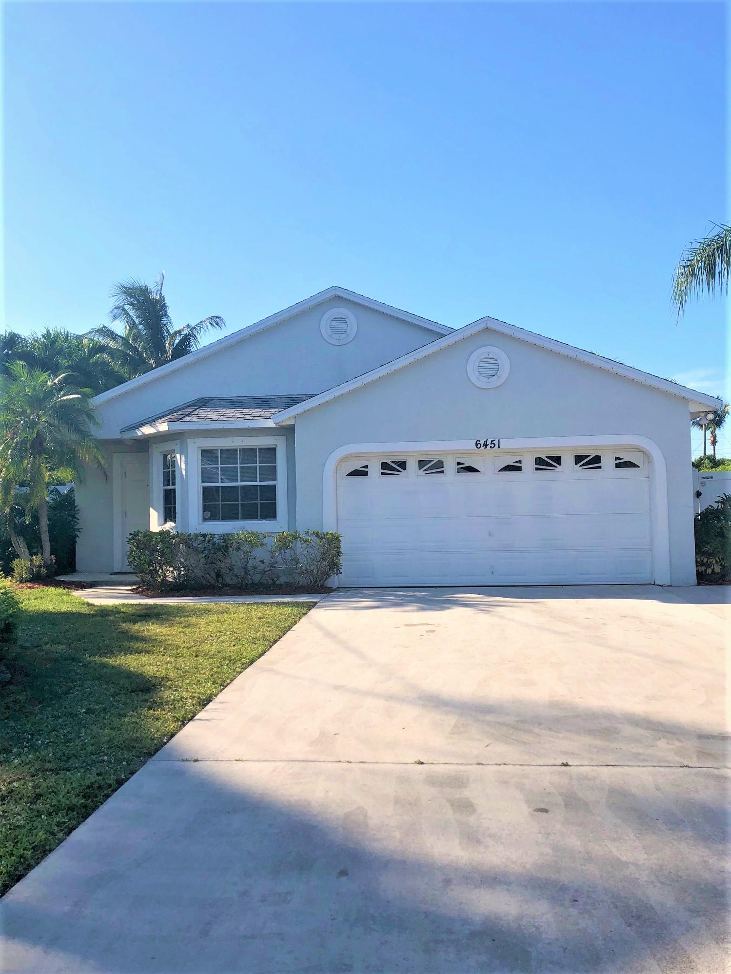 6451 Foster Street Jupiter, FL 33458 - Photo 1 of 25 Front