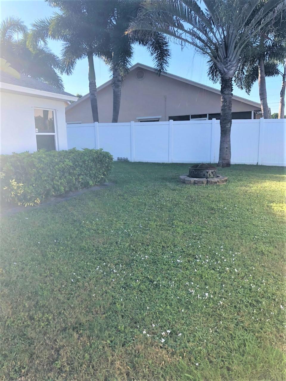 6451 Foster Street Jupiter, FL 33458 - Photo 3 of 25 Side