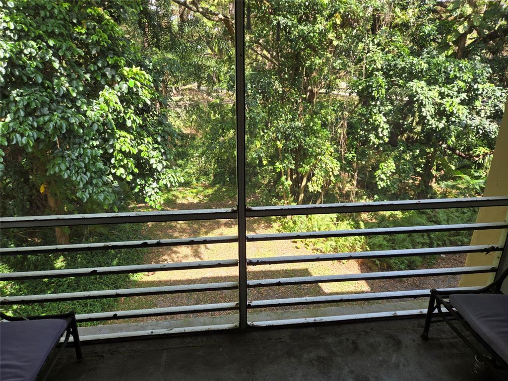 9400 Live Oak Place, Unit 305 Davie, FL 33324 - Photo 20 of 93 Back Screened In Patio Overlooking The Ridge.