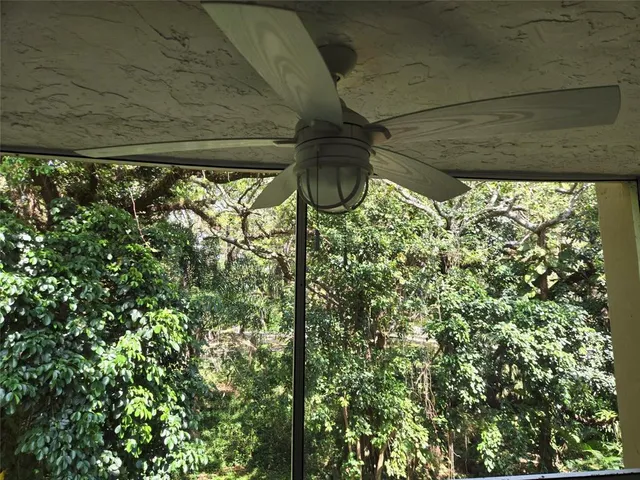 a view of a patio with wooden floor