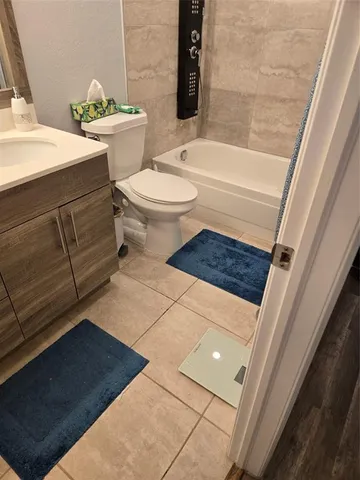 a view of street with parked cars