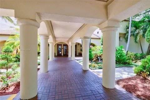 9400 Live Oak Place, Unit 305 Davie, FL 33324 - Photo 3 of 93 Covered Country Club Entrance.