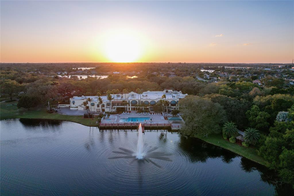 9400 Live Oak Place, Unit 305 Davie, FL 33324 - Photo 4 of 93 Back Side Of Country Club, Lake and Swimming Pool.