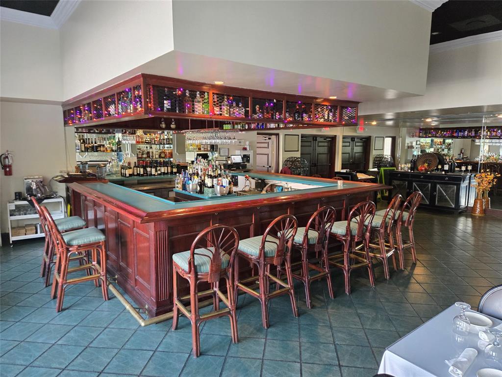 9400 Live Oak Place, Unit 305 Davie, FL 33324 - Photo 41 of 93 a view of a chairs and a table in a room