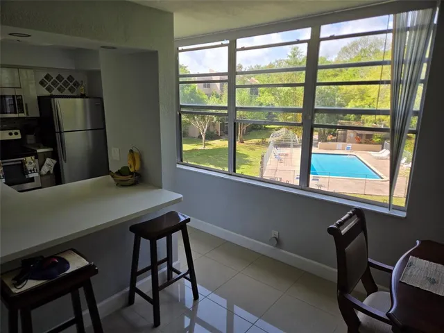 a bathroom with a toilet and a bathtub