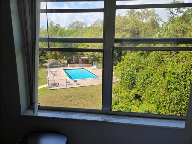 a view of a room with a window