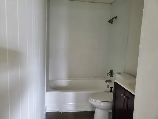 a bathroom with a sink and a toilet