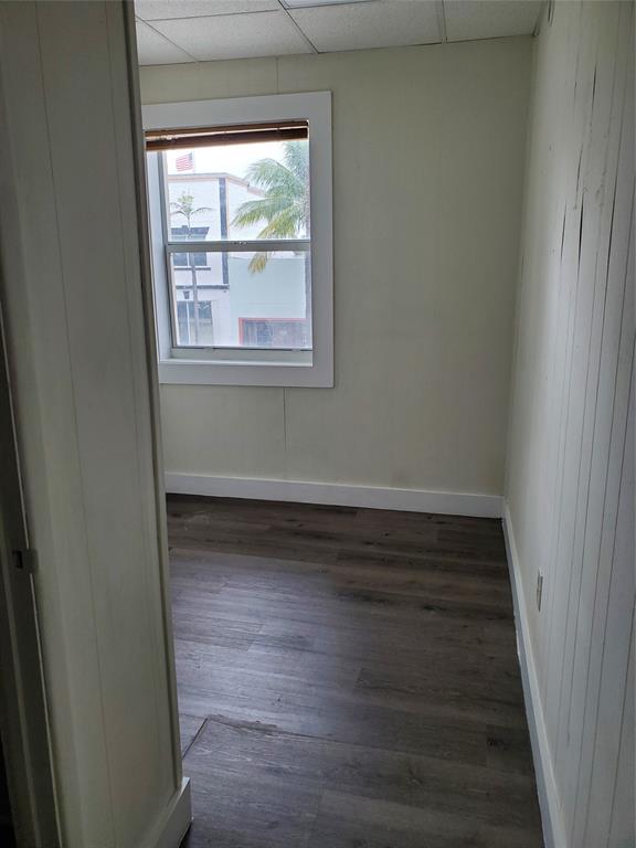 50 North Federal Highway, Unit 4 Dania Beach, FL 33004 - Photo 8 of 22 a view of a small space with wooden floor and a window