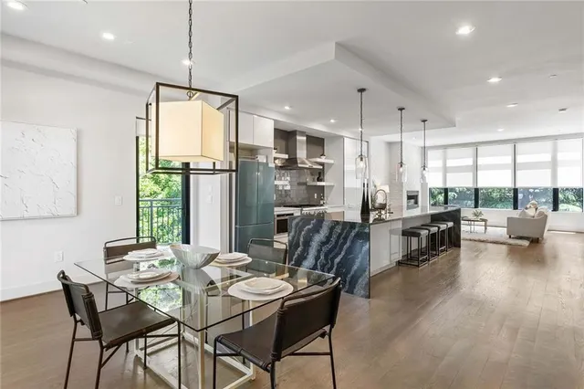 a bathroom with a sink toilet and a mirror