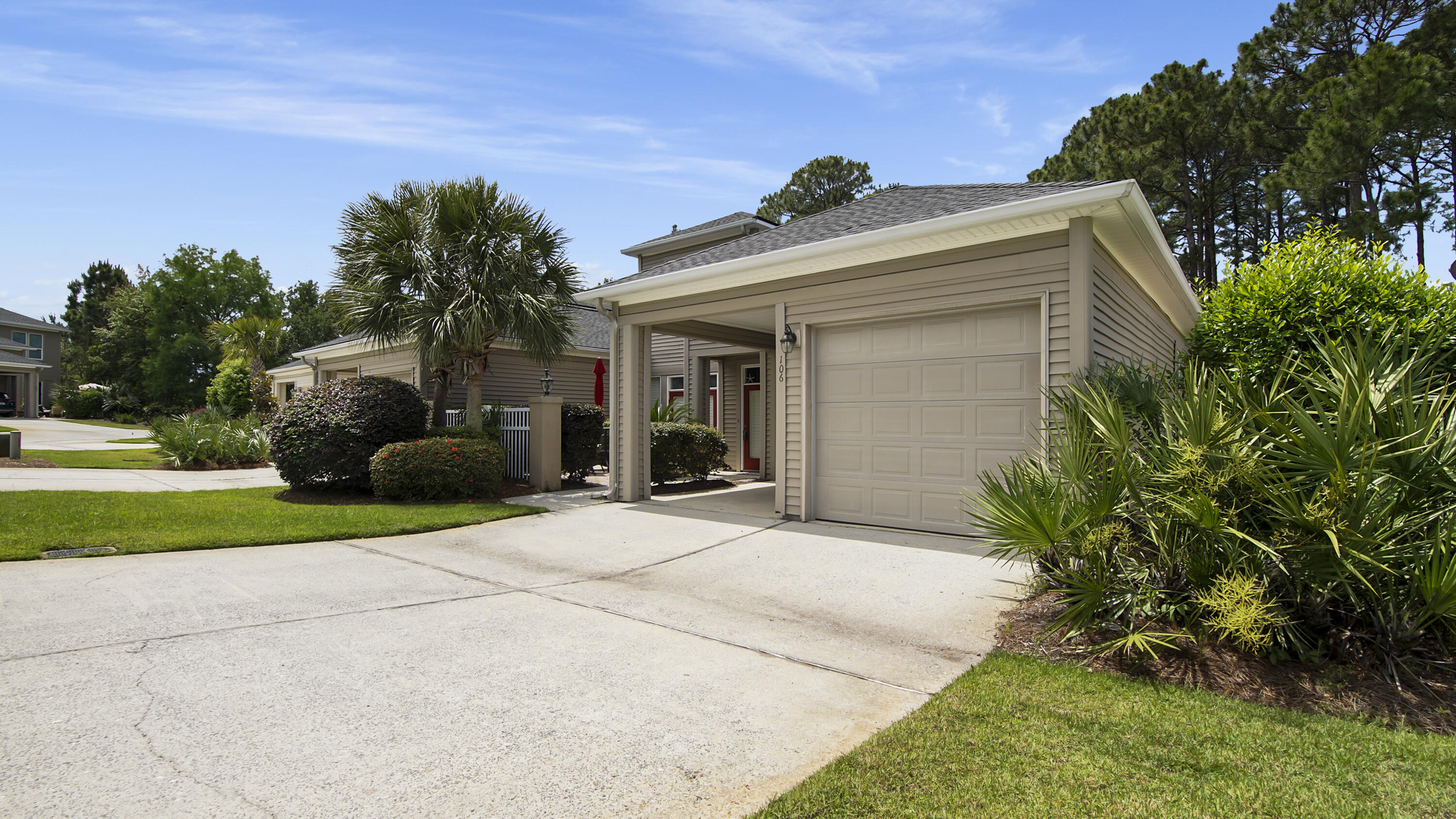 106 Courtyard Circle Santa Rosa Beach, FL 32459 - Photo 8 of 38 a view of a house with a yard