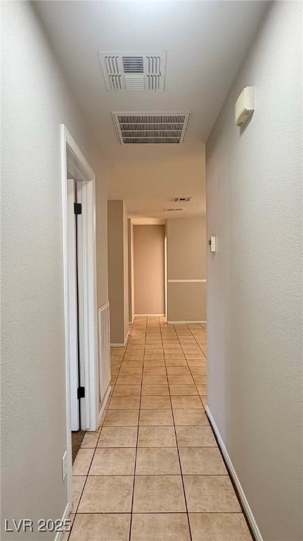 7113 Pinelake Road Las Vegas, NV 89145 - Photo 11 of 22 Corridor with light tile patterned flooring and baseboards