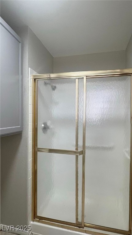 7113 Pinelake Road Las Vegas, NV 89145 - Photo 10 of 22 Bathroom with a stall shower and baseboards