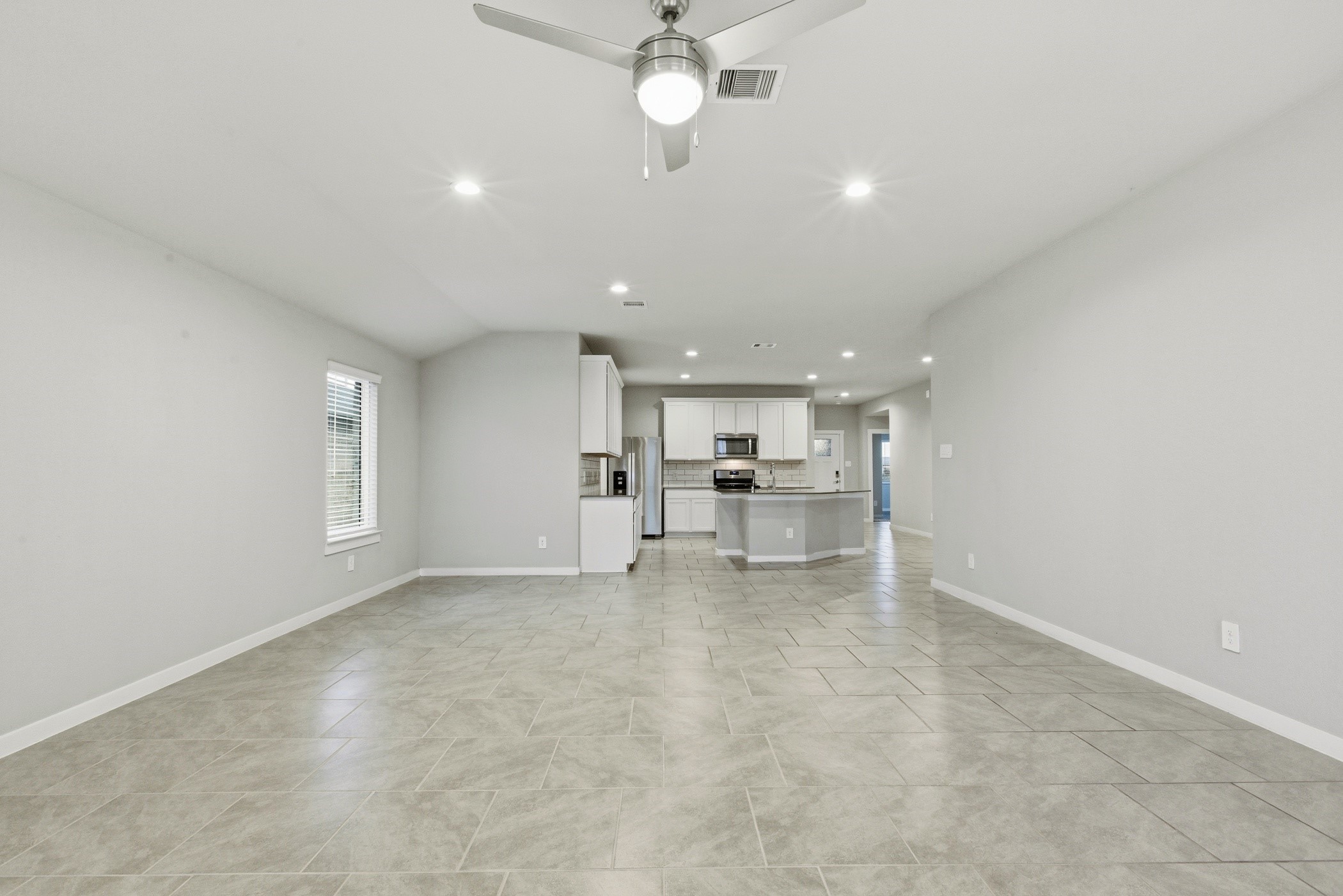 29731 Cayenne Circle Katy, TX 77494 - Photo 21 of 41 a view of kitchen with wooden floor and a window