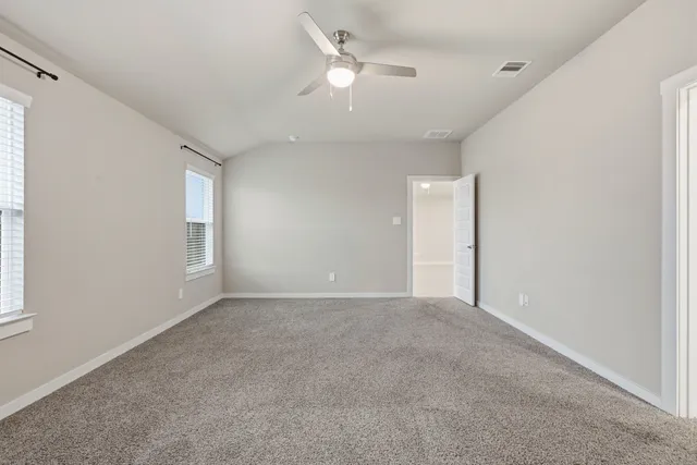 a bathroom with a sink vanity and tub