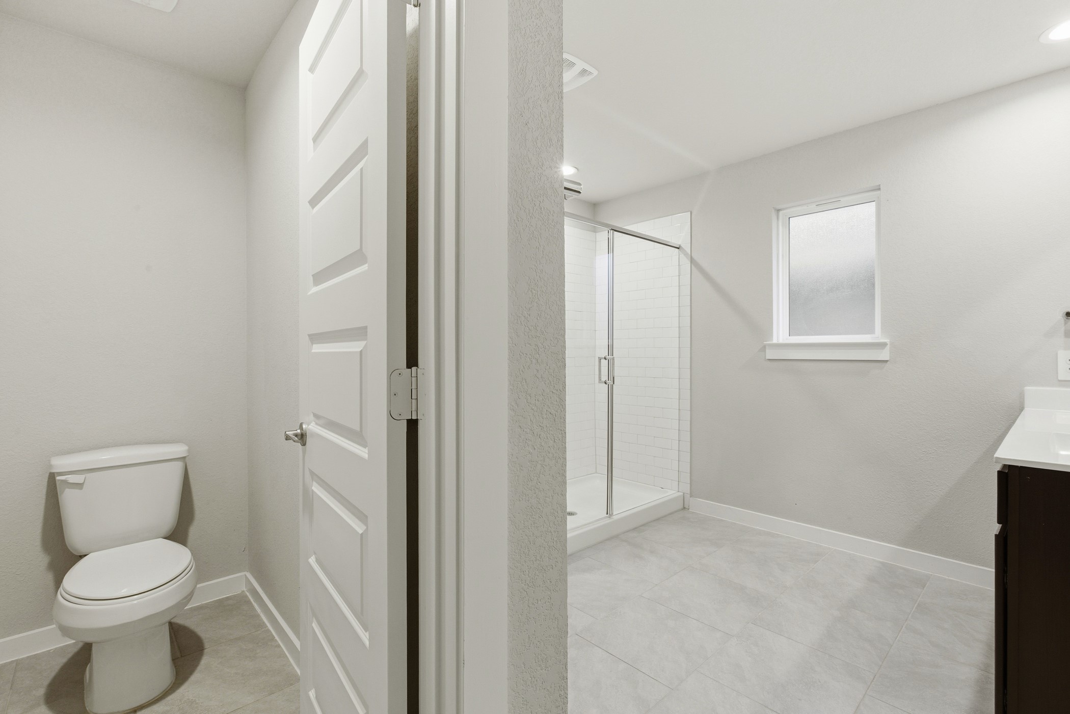 29731 Cayenne Circle Katy, TX 77494 - Photo 30 of 41 a bathroom with a toilet sink and a shower