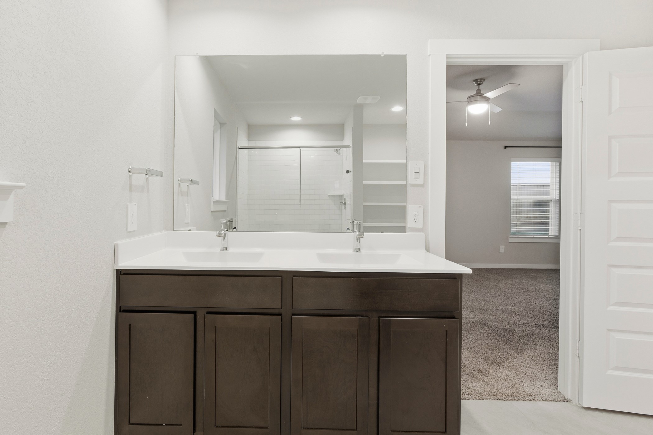 29731 Cayenne Circle Katy, TX 77494 - Photo 31 of 41 a bathroom with a sink and a mirror