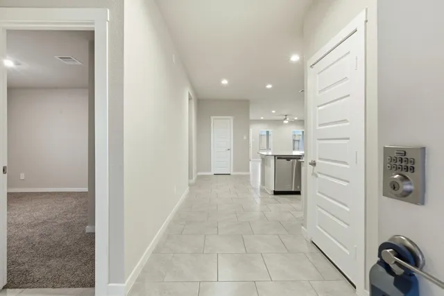 a bathroom with a bathtub and a sink