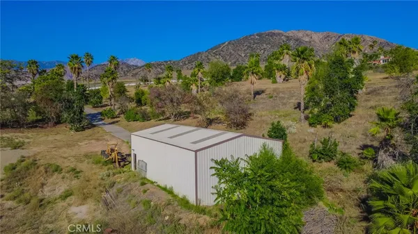 a view of a garden with an outdoor space