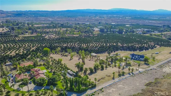 a view of a city with mountains in the background