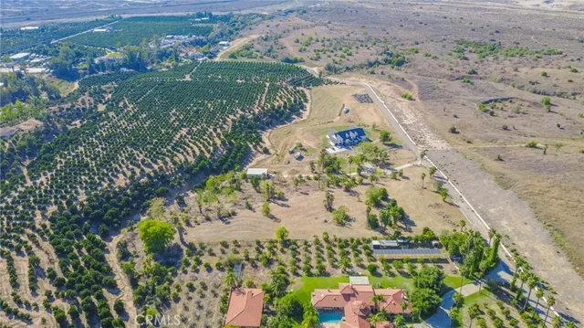 a view of mountains with green space