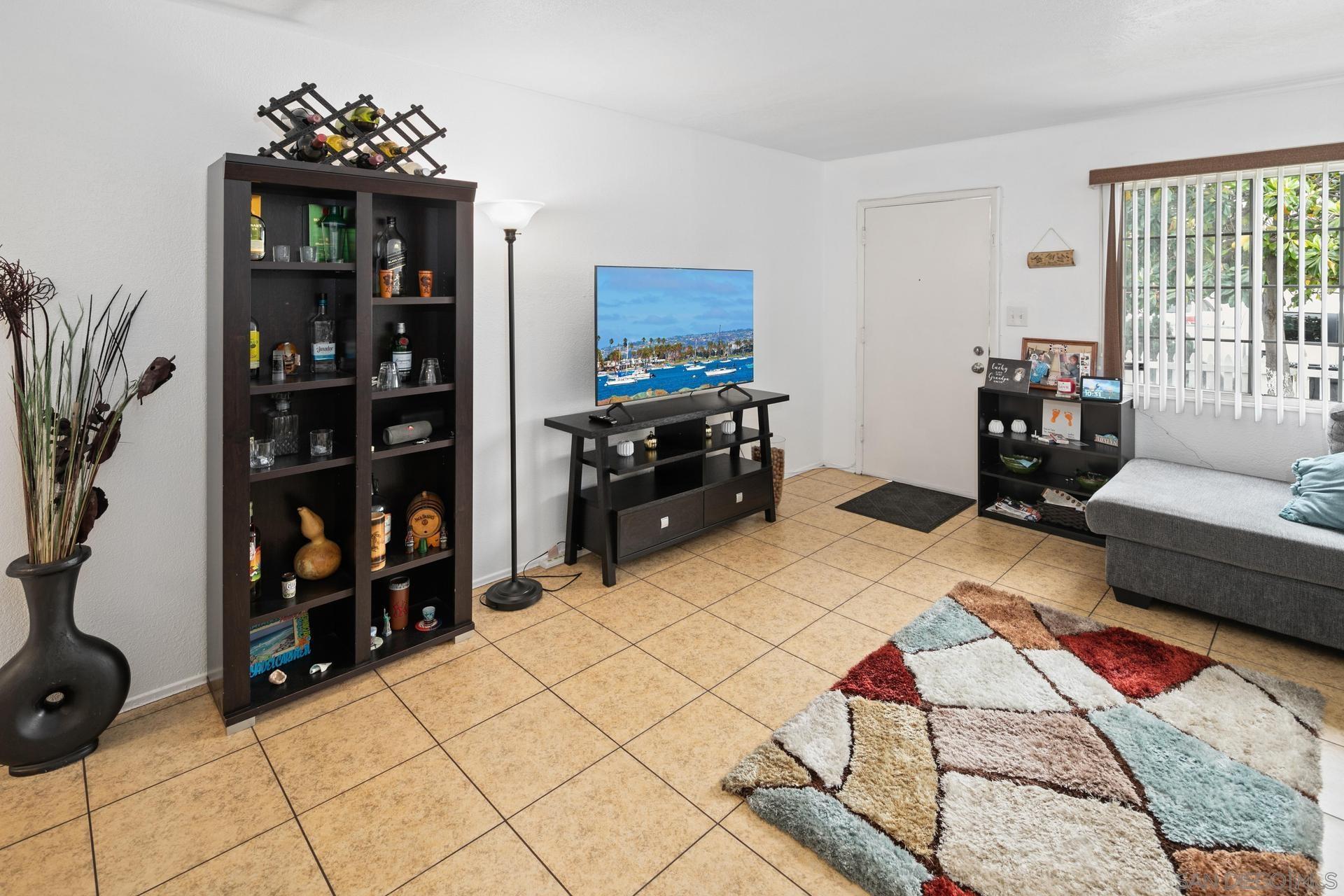 563 Madrona Street Chula Vista, CA 91910 - Photo 27 of 41 a living room with furniture and a flat screen tv