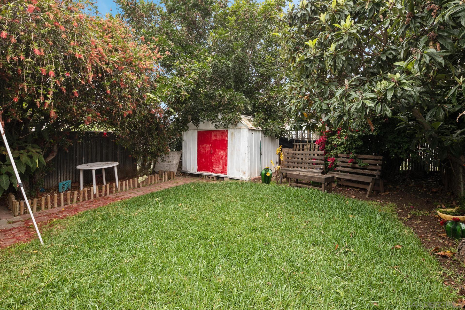 563 Madrona Street Chula Vista, CA 91910 - Photo 35 of 41 a front view of a house with a garden