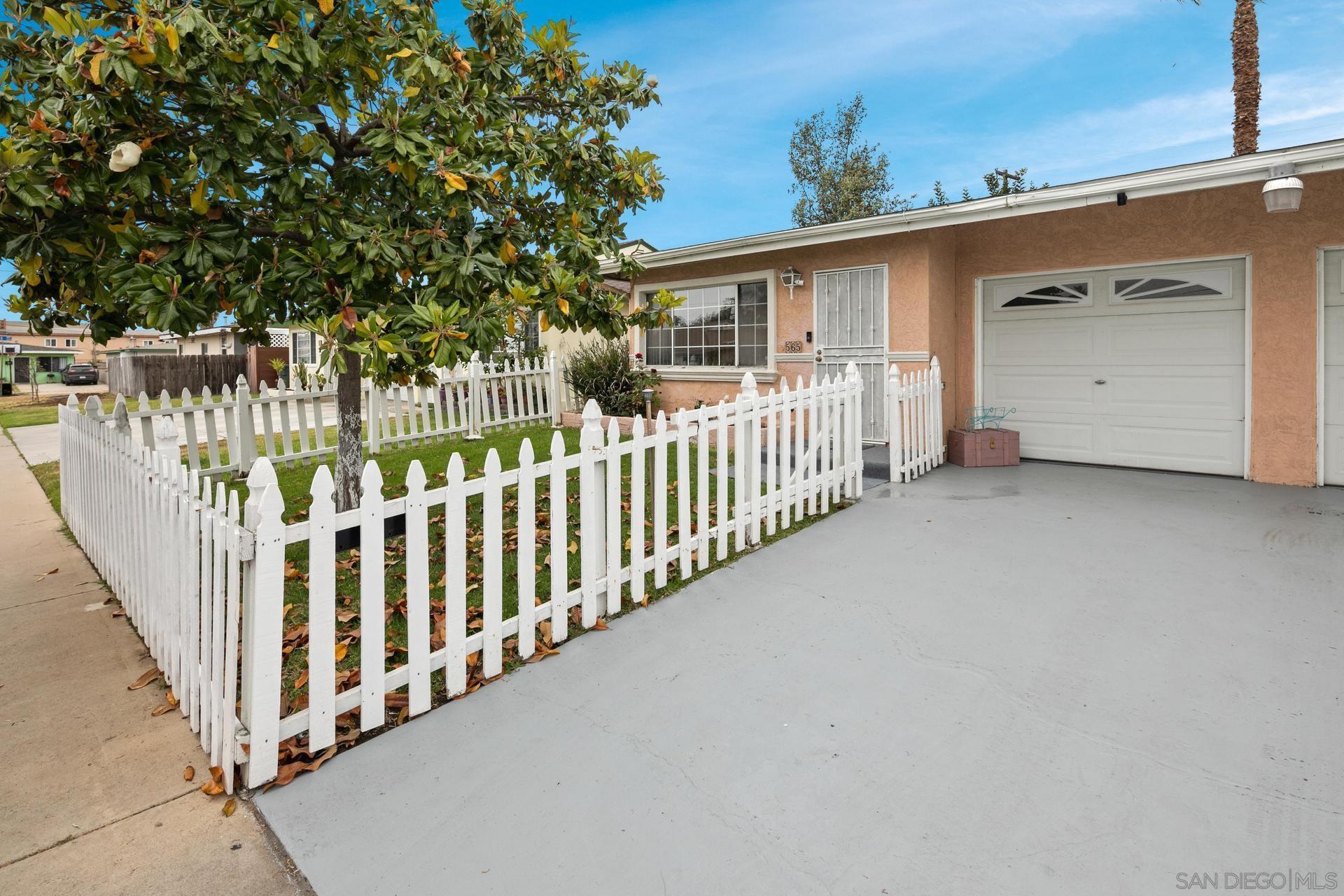 563 Madrona Street Chula Vista, CA 91910 - Photo 5 of 41 a view of a house with wooden fence