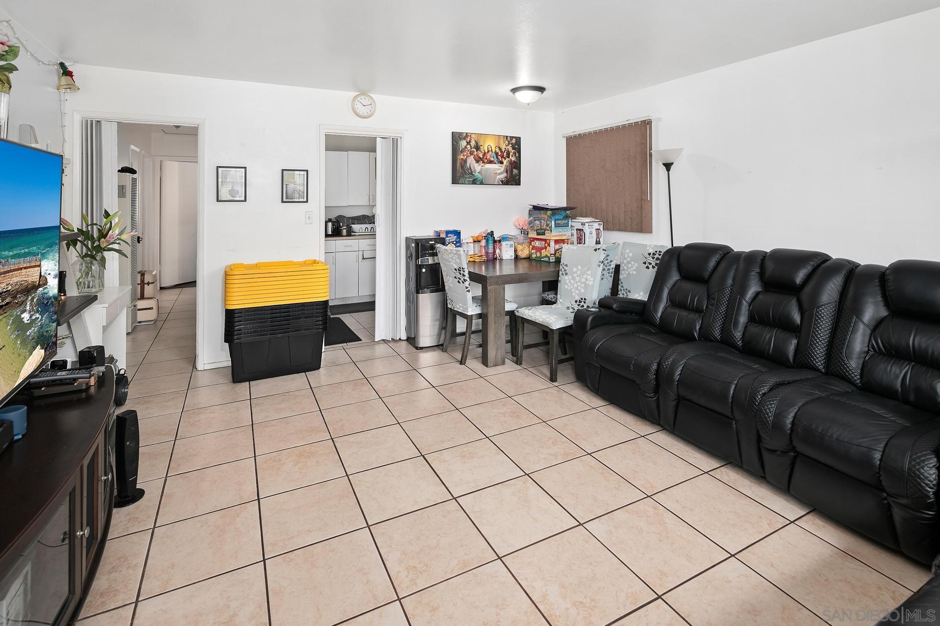 563 Madrona Street Chula Vista, CA 91910 - Photo 8 of 41 a living room with furniture and a flat screen tv