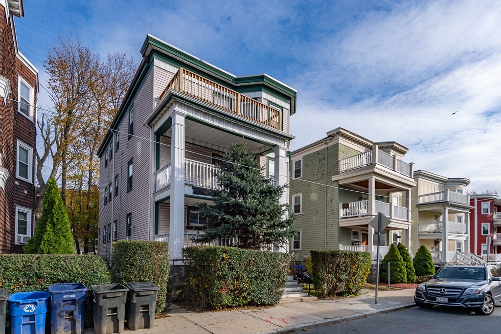 18 Santuit Street Boston, MA 02124 - Photo 4 of 17 a car parked on the side of a street