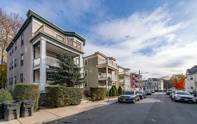 a car parked in front of a building